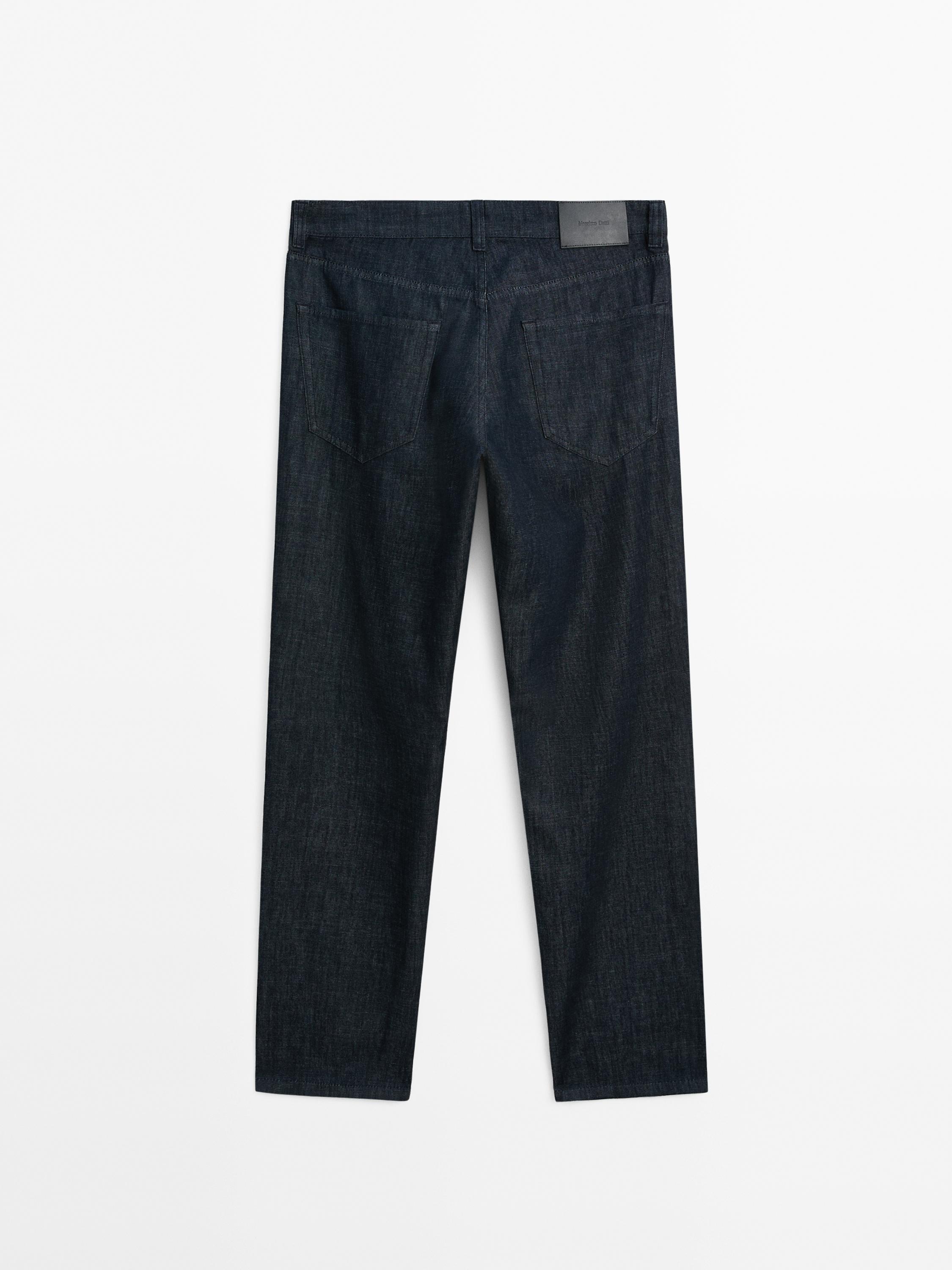 Cotton blend tapered fit jeans